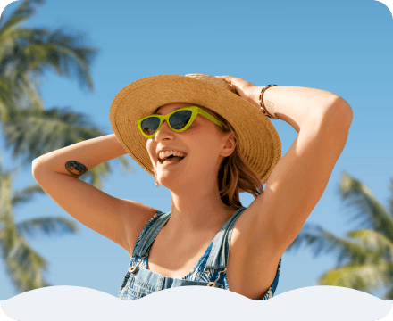 A smiling woman on vacation.