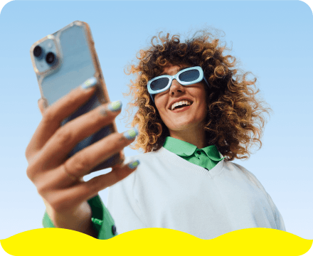 A woman using a phone.