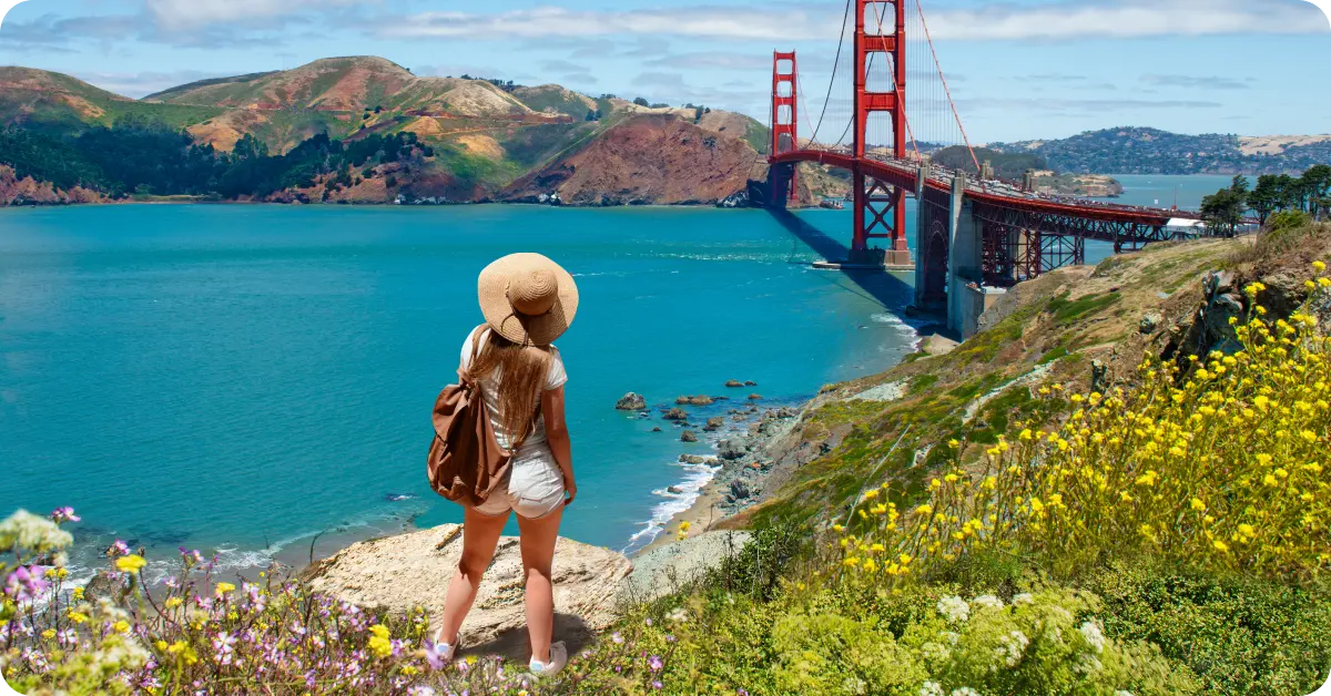 A person looking at the Golden Gate bridge