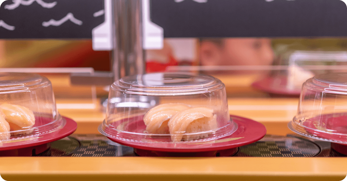 Eat at a kaiten sushi restaurant
