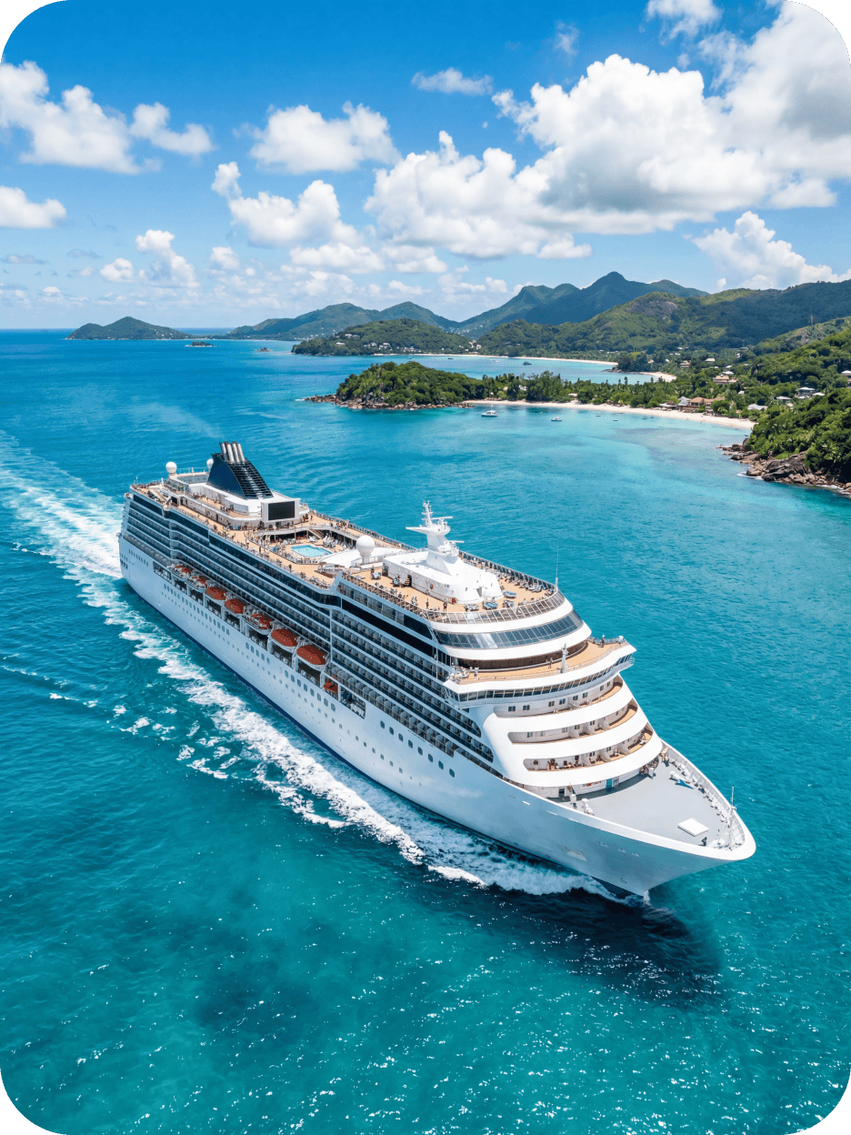 An aerial view of a large white cruise ship sailing through turquoise waters near green tropical islands.