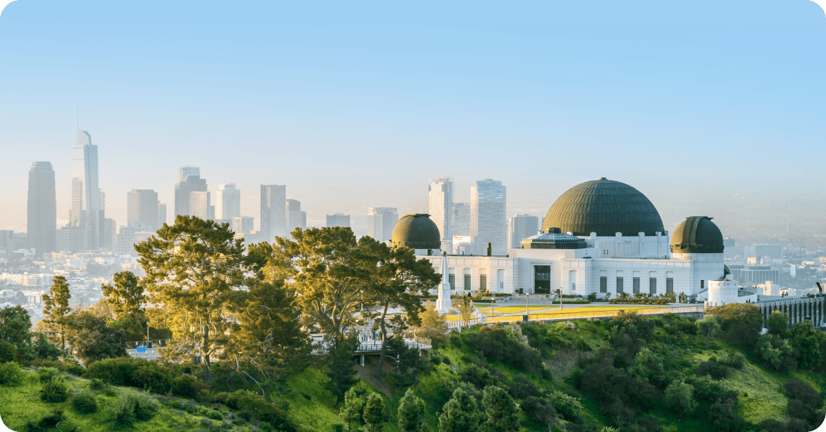 Griffith Observatory with a city skyline