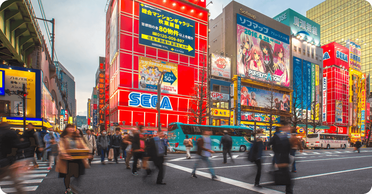 People crossing a busy street