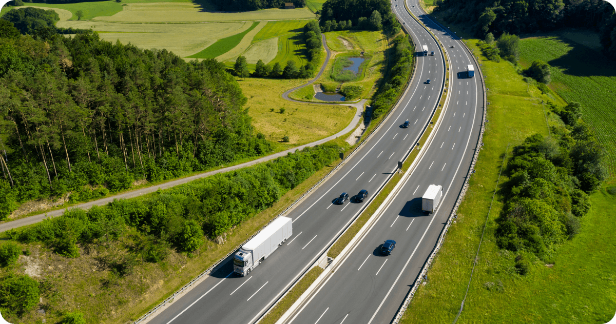 The Autobahn with cars driving on both sides of the road.