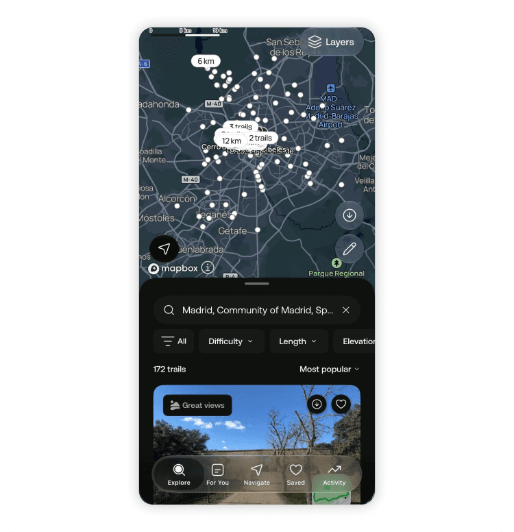 AllTrails app showing a map of hiking trails around Madrid