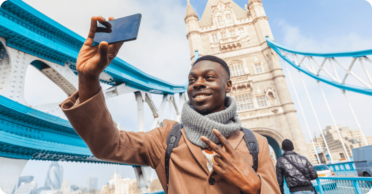 Man taking photos on London Tower Bridge