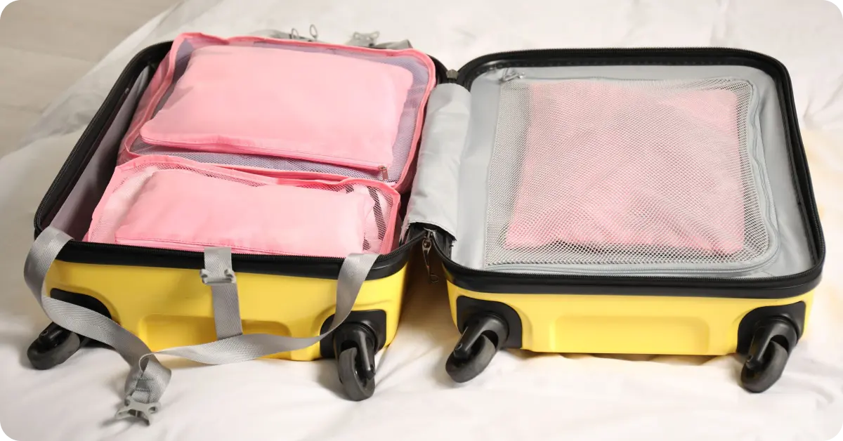 A packed luggage on a bed