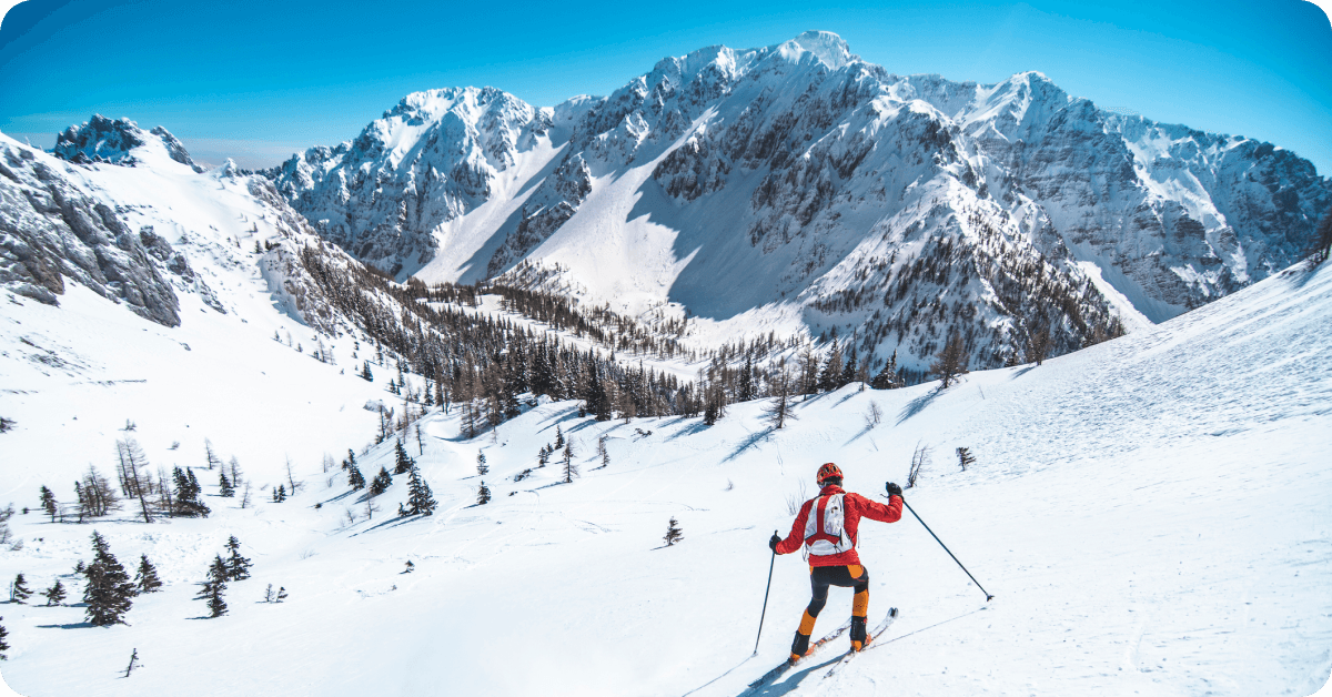 A tourist skis in the Italian mountains.