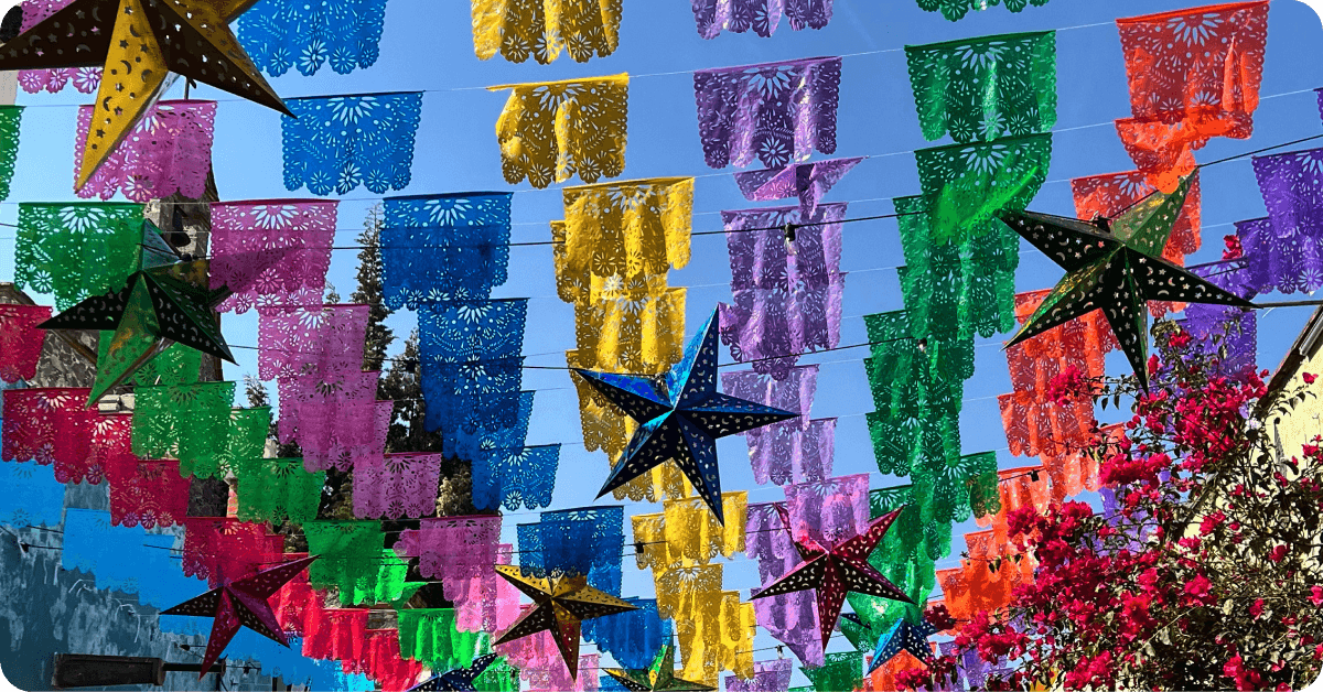 Flags hang over a street to celebrate Cinco de Mayo.