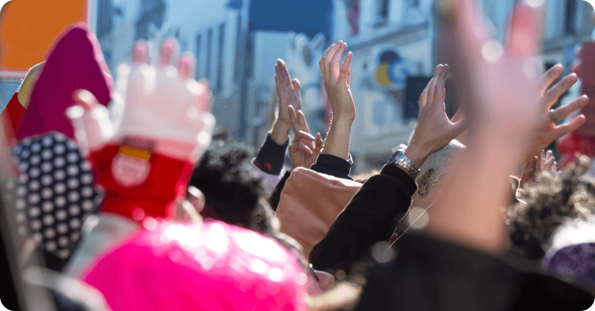 People celebrate at the Macy's Thanksgiving Day Parade.