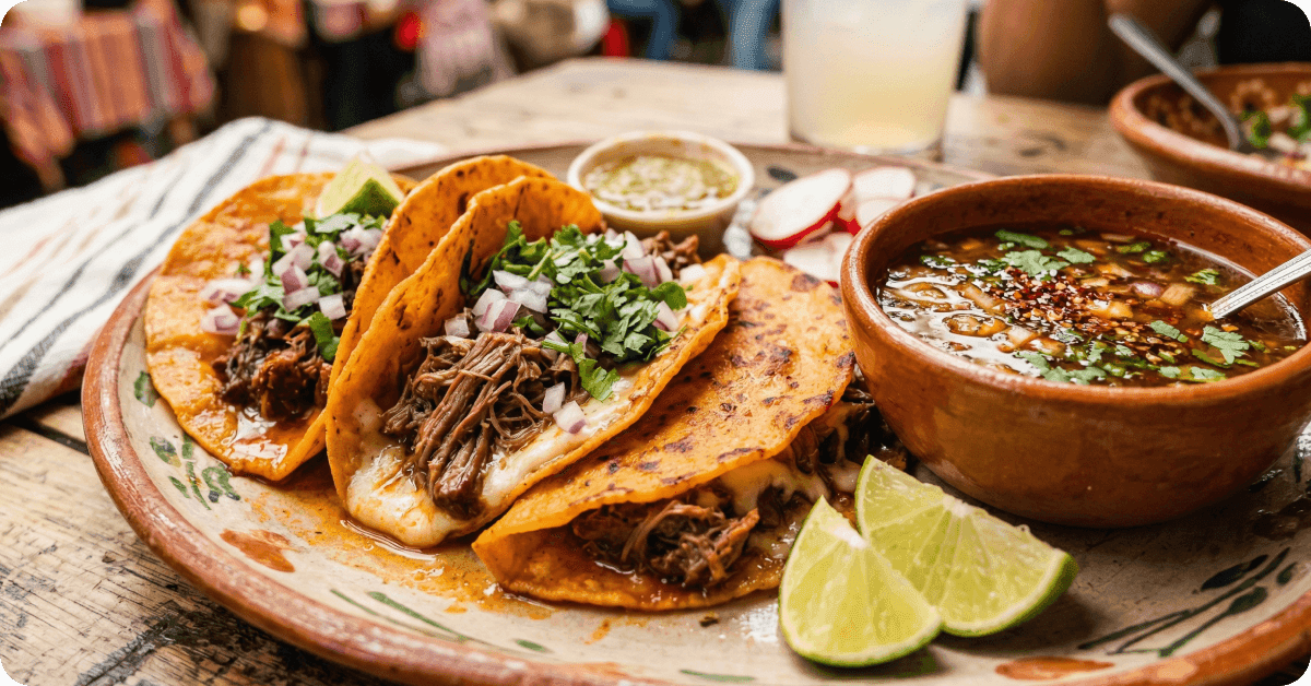 Birria tacos or birria torta (sandwich filled with birria)