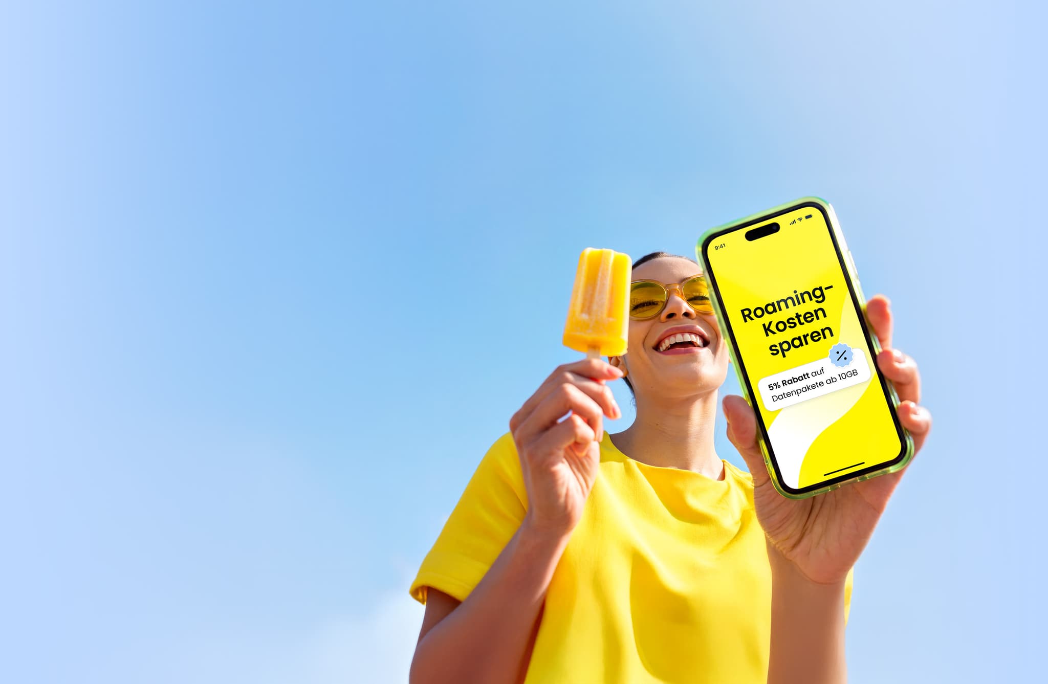 A woman using the Saily eSIM app on her phone to save on roaming costs while traveling.